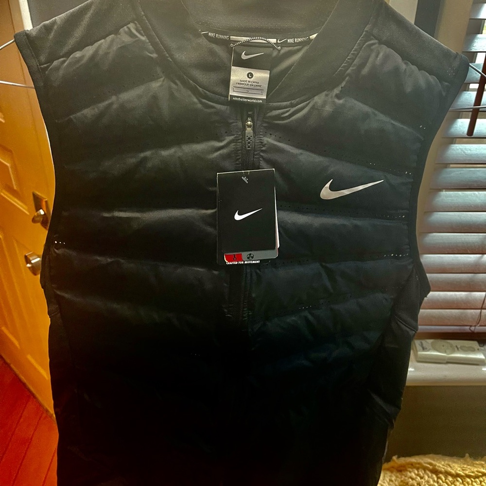 Nike runners vest- new. Never worn